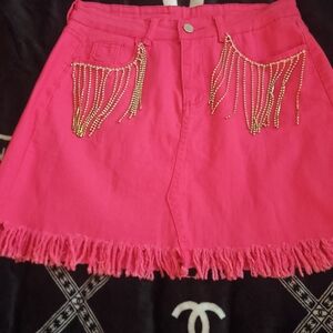 Vibrant Pink Skirt with Gold Chain Details
